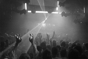 inside a night-club people dancing