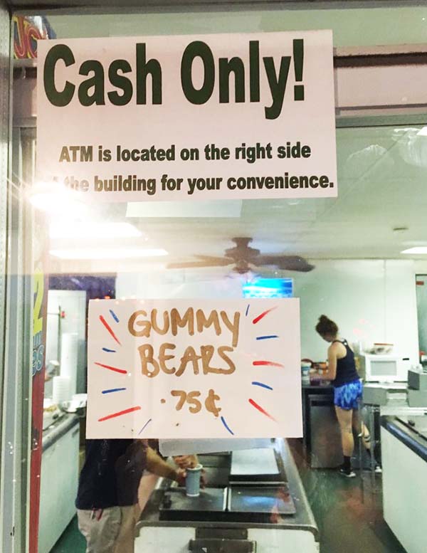 Cash Only ATM Located Inside of Store Sign in Storefront Window